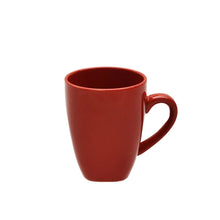 Red stoneware coffee mug with curved handle and glossy finish