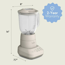 Countertop blender with clear jar and lid, with height and width dimension indicators