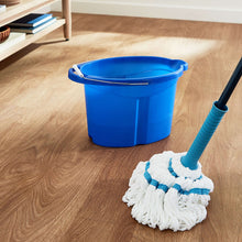 Microfiber twist mop on floor with blue bucket and blue handle