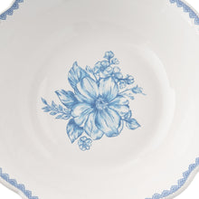 Blue floral medallion on stoneware cereal bowl interior