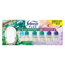 Febreze PLUG air freshener set with white warmer and five scented refills in retail packaging