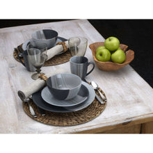 Gray stoneware dinnerware set on tray with plates, bowls, cups, and saucers