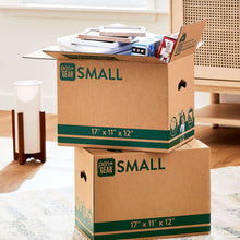 Kraft small moving box with green banding, plus a second smaller box