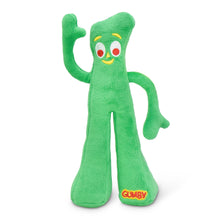 Green plush character dog toy standing, with embroidered eyes and red smile