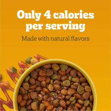Dog food savory sauce contents, brown kibble topped with glossy sauce