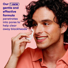Oil-free acne toner application on face, person wiping with tissue