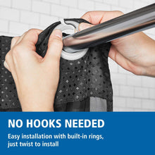 Black shower curtain top with built-in ring, hands adjusting curtain on rod