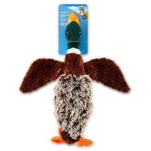 Plush duck dog toy in retail blister pack: green head, brown wings, orange feet