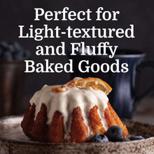Fluffy glazed cake with berries on a plate