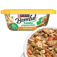 Purina Beneful chicken stew wet dog food cup with serving of stew in a bowl