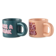 Stoneware mugs in profile: dark green “Take a Break” and pink “Self Love Club”