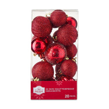 Mini red Christmas ornaments set in clear box with assorted red ball and cap styles