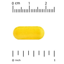 Yellow supplement tablet shown with size scale in inches and centimeters
