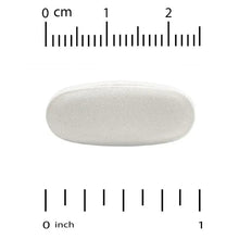 White oval MSM tablet shown with metric and inch scale rulers