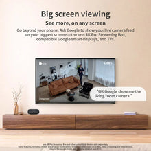 Indoor wired security camera live feed on TV screen showing living room view