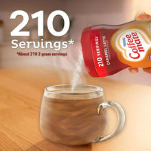 Caramel latte coffee creamer bottle pouring into mug, 210 servings shown on label