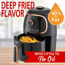 Brentwood 2-quart air fryer with open basket and fries, black with copper trim