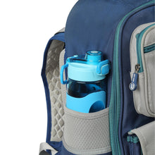 Blue Tritan water bottle in a silicone sleeve attached to a backpack pocket