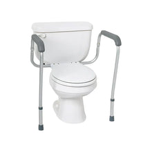 Medline toilet safety rails with gray arm pads and curved support arms, white frame