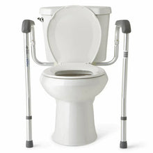 Toilet safety rails with gray arm pads, positioned around a toilet bowl