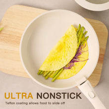 Cream white nonstick frying pan with omelet-style food
