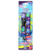 Tamagotchi Paradise lanyard package with blue character lanyard and badge charm