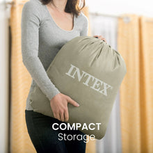 Airbed storage bag in olive green held by a person