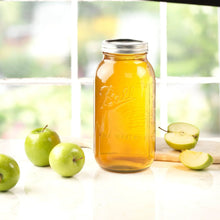 Wide-mouth mason jar with amber glass finish and metal lid, Ball logo