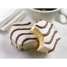 ZEBRA® snack cake with yellow cake, white icing, and chocolate drizzle