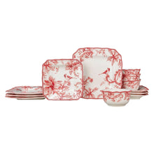 Red-and-white floral and bird dinnerware set, stacked plates and bowls