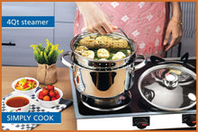 Stainless steel steamer pot with perforated basket on a stovetop.