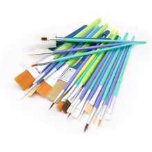 Assorted paint brushes with multicolor handles and bristles laid on a white surface