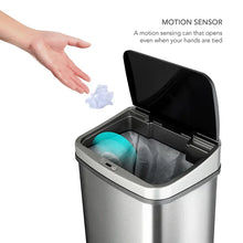 Stainless steel motion-sensor trash can with open lid and inner bin liner