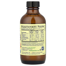 Liquid vitamin C bottle, supplement facts label on back, amber bottle, black cap