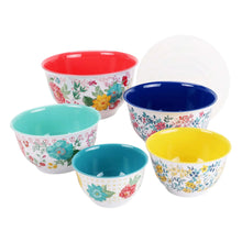 Colorful floral melamine mixing bowls set with mixed interiors in red, teal, blue, and yellow