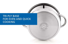 Stainless steel steamer pot bottom with handles, close-up view