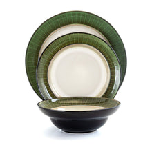 Stoneware dinnerware set with round plates featuring jade grid trim and dark bowls
