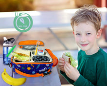 Child eating beside a blue space print insulated lunch bag on a table