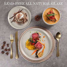 Speckled ceramic dinner plates and bowls set in cappuccino brown, with bowls and spoons