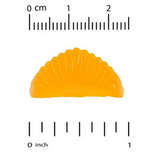 Orange vitamin C gummy slice with curved shape