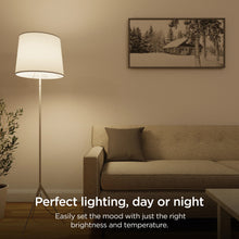 Smart LED bulb in a standing lamp, warm light on in a living room
