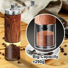 Manual coffee grinder with wooden housing and stainless chamber, grinding inside
