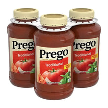 Prego traditional pasta sauce jar with dark red tomato sauce and cream lid