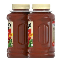 Prego traditional pasta sauce jars, dark red sauce with cream caps, front view