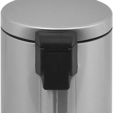 Stainless steel pedal bin with center black pedal mechanism and open lid edge