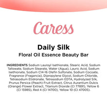 Daily Silk floral oil essence beauty bar ingredient panel with Caress logo