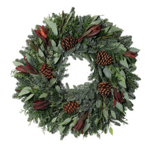 Greenery wreath with pinecones and burgundy leaf accents