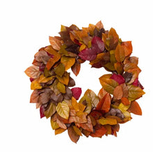 Preserved fall wreath with layered orange, brown, and burgundy leaves