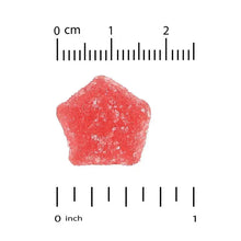 Raspberry gummy supplement with cm and inch size markers