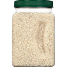Rice jar with green lid filled with white long-grain rice